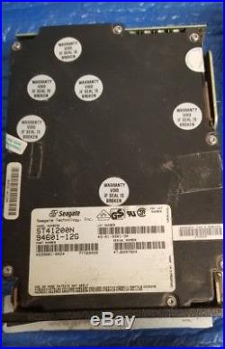 (4) VTG Seagate st 94171 41200 MPI SCSI Hard Drive Full Height 5.25 DRIVES PART
