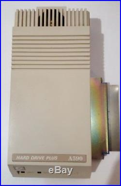 Amiga A590 2MB Ram v7.0 rom, Expansion and SCSI Hard Drive adapter, PSU included