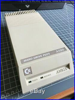 Commodore Amiga A590 Hard Drive with upgraded 50 MB SCSI HD and 2Mb RAM Upgrade